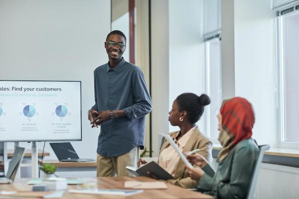 Person presenting at a whiteboard